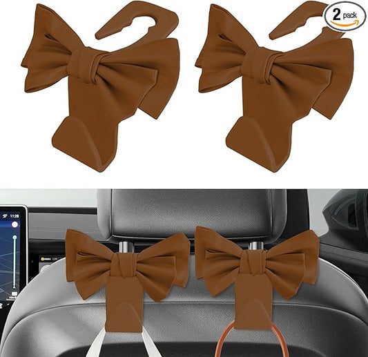 2PCS Car Purse Hooks, Car Hooks for Purses and Bags Cute, Cute Bow Shaped Vehicle Backseat Storage Hanger, Auto Leather Bow Back Seat Storage Hanging Holder Universal for Women Girls (Brown)