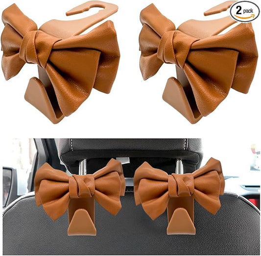 2PCS Purse Holder for Car Hooks, Cute Bow Car Seat Headrest Hooks Handbag Hanger, Bow Knot Auto Back Seat Organizer Storage Hook for Purse Bags Umbrellas, Car Accessories (Brown)